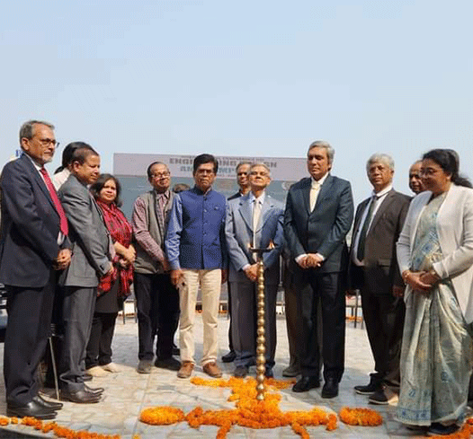 Dignitaries lighting the ceremonial lamp at a Swami Vivekananda University event