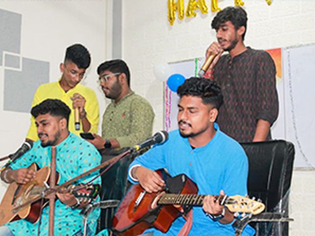 Students performing music at the NSS Day celebration