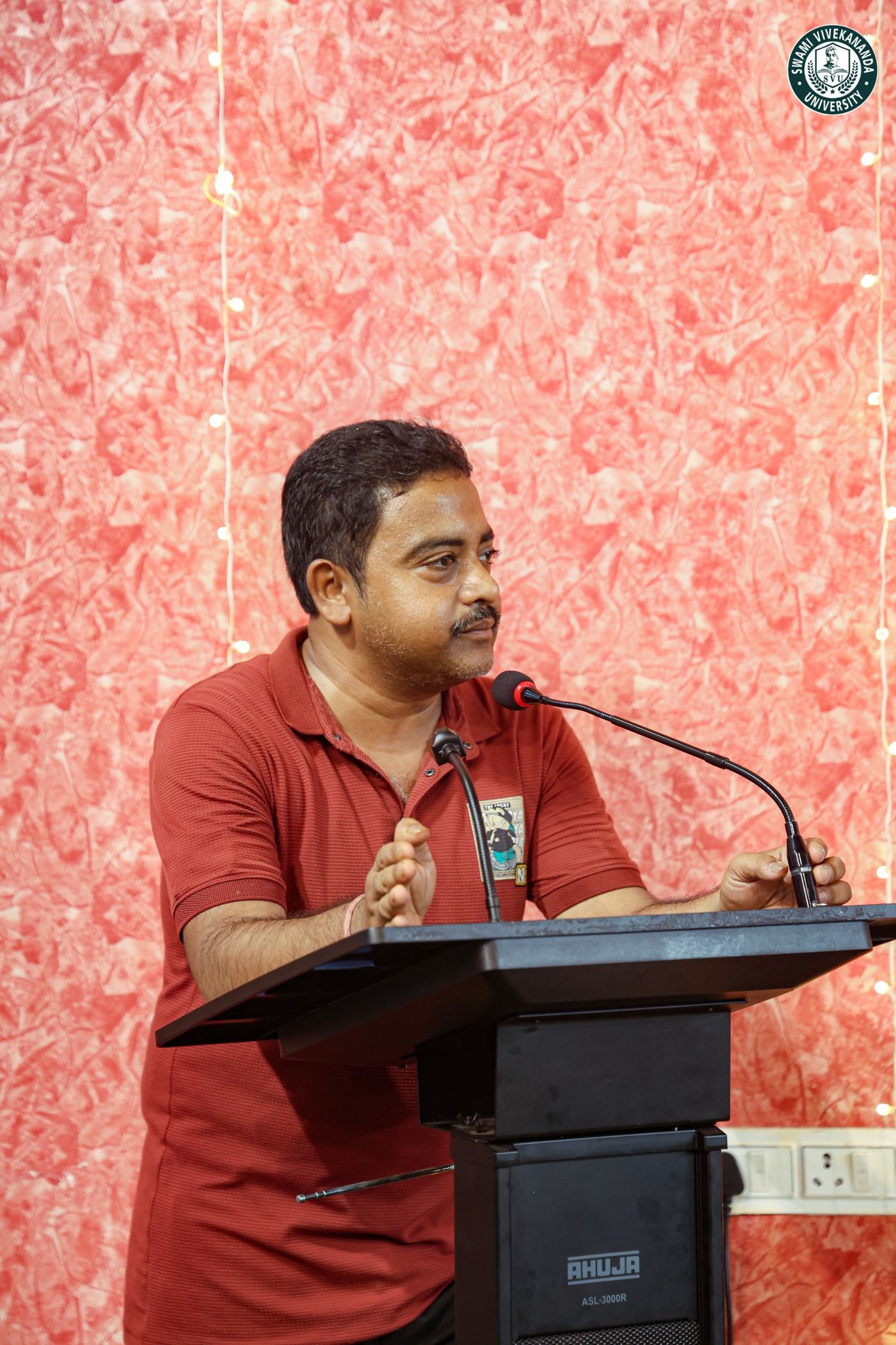 A member of staff addressing the gathering during the celebration