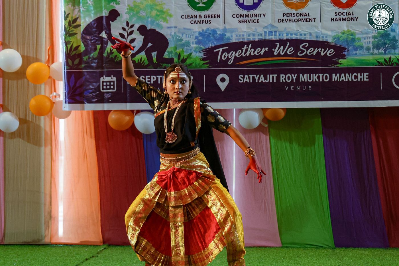 A student mid-performance on the NSS Day stage