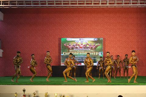 A competitor on stage at the Vivekananda Shree Open State Bodybuilding Championship
