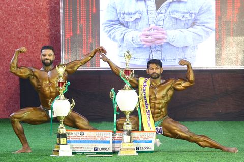 A competitor on stage at the Vivekananda Shree Open State Bodybuilding Championship