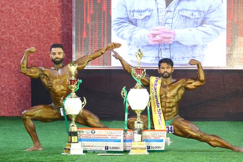 A competitor on stage at the Vivekananda Shree Open State Bodybuilding Championship