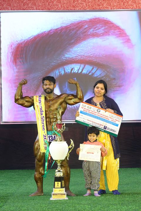 A competitor on stage at the Vivekananda Shree Open State Bodybuilding Championship