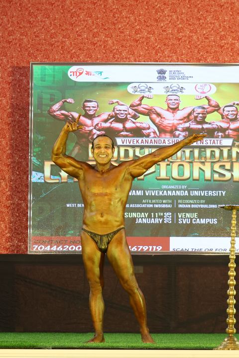 A competitor on stage at the Vivekananda Shree Open State Bodybuilding Championship