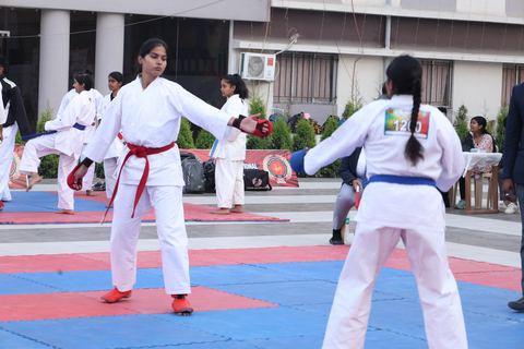 Cadets competing at the karate tournament on campus