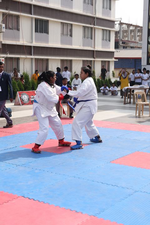 Cadets competing at the karate tournament on campus