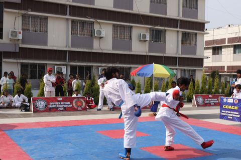 Cadets competing at the karate tournament on campus