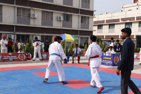 Cadets competing at the karate tournament on campus