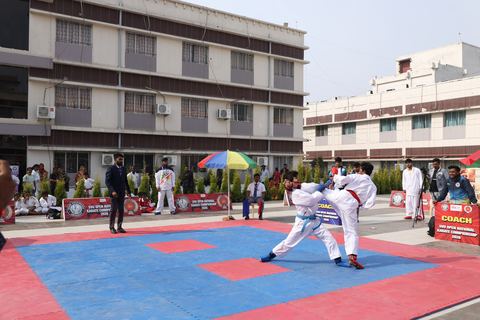 Cadets competing at the karate tournament on campus