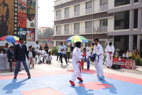 Cadets competing at the karate tournament on campus