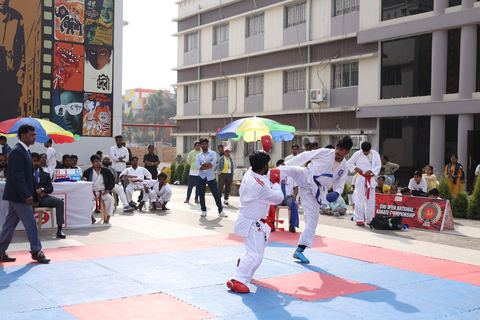 Cadets competing at the karate tournament on campus