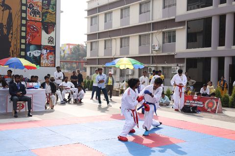 Cadets competing at the karate tournament on campus