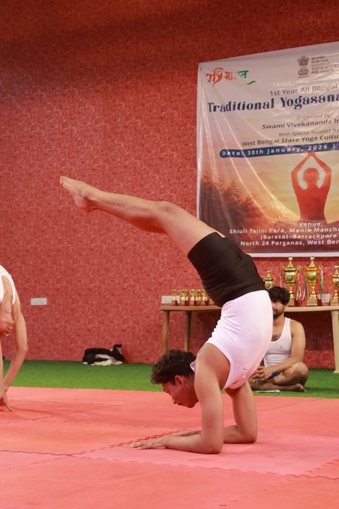 A student performing an asana at the yogasana competition on campus