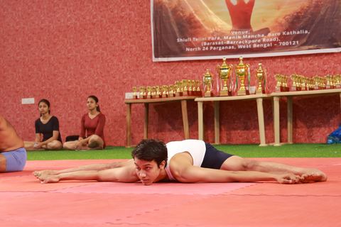 A student performing an asana at the yogasana competition on campus