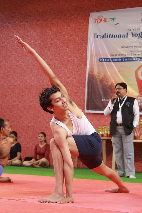 A student performing an asana at the yogasana competition on campus