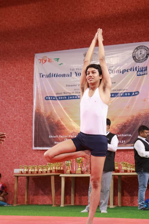 A student performing an asana at the yogasana competition on campus