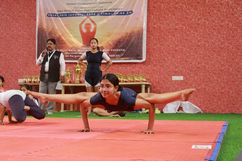 A student performing an asana at the yogasana competition on campus